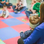 parents with infants at library program