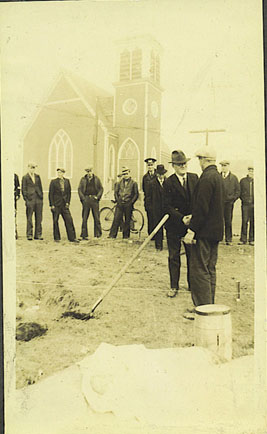 Men gathered to watch the sod turning for building of Louisbourg post office1935