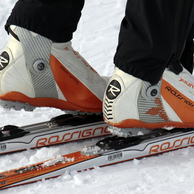 close-up of person wearingrossignol nordic skis and boots