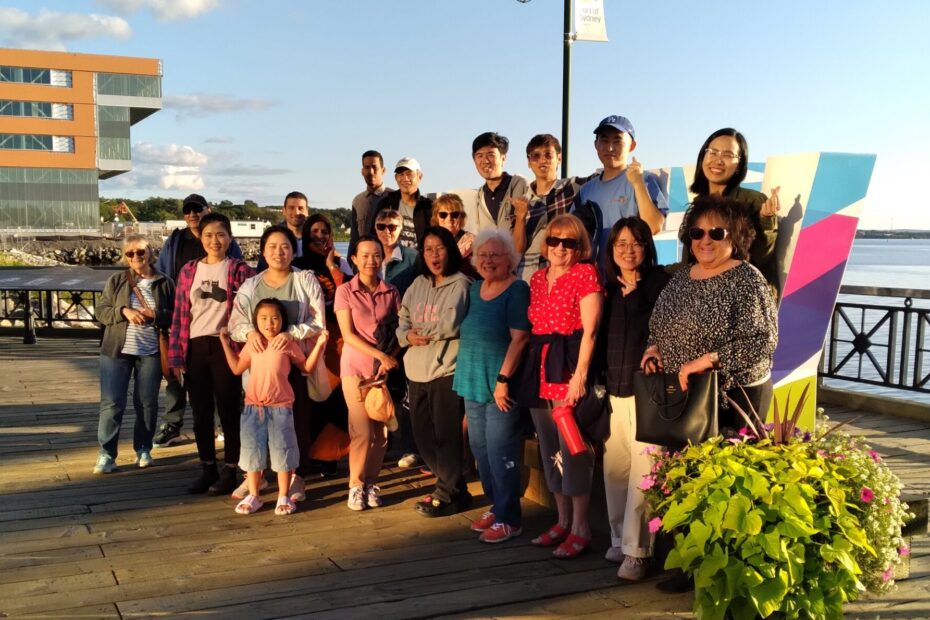 English conversation group participants at Sydney waterfront.