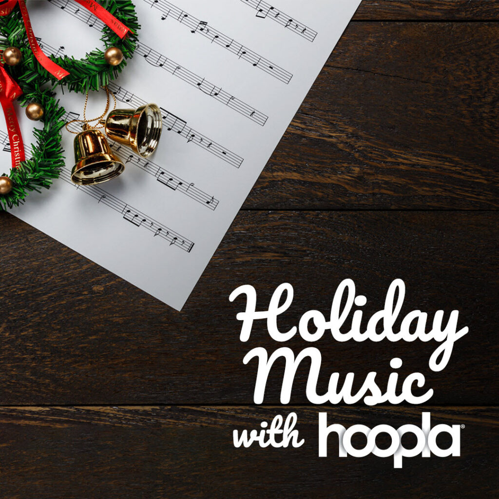 Sheet music and Christmas bells. Holiday Music with Hoopla