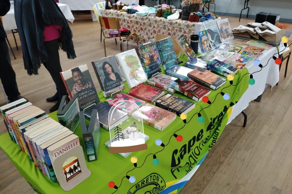table of books on display at Holiday Market