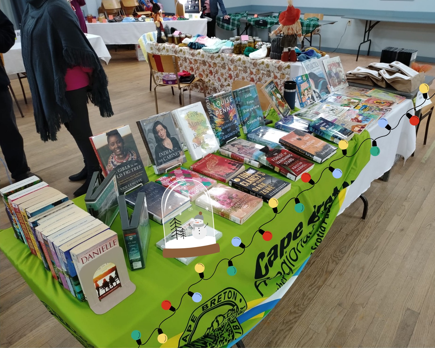 table of books on display at Holiday Market