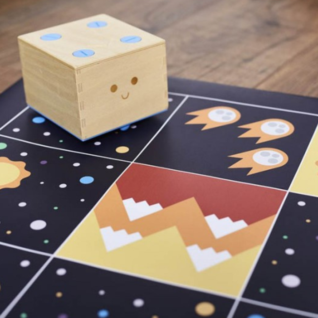 Cubetto wooden robot on deep space adventure map