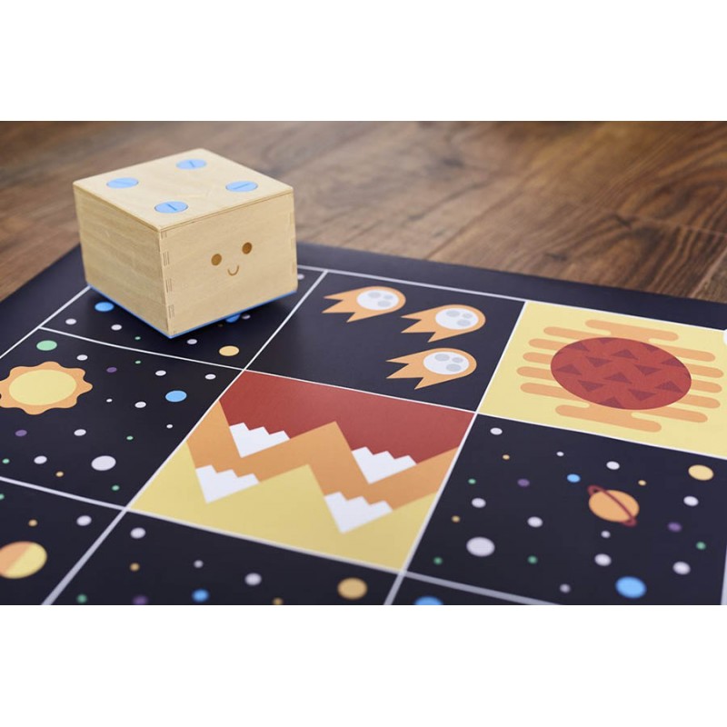 Cubetto wooden robot on deep space themed adventure mat