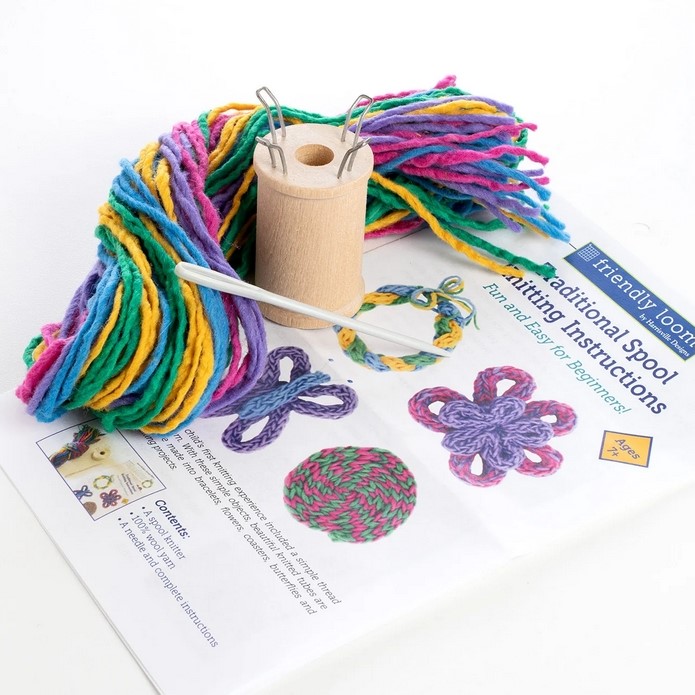 Spool Knitting Contents: Yarn, knitting spool, darning needle and instructions.